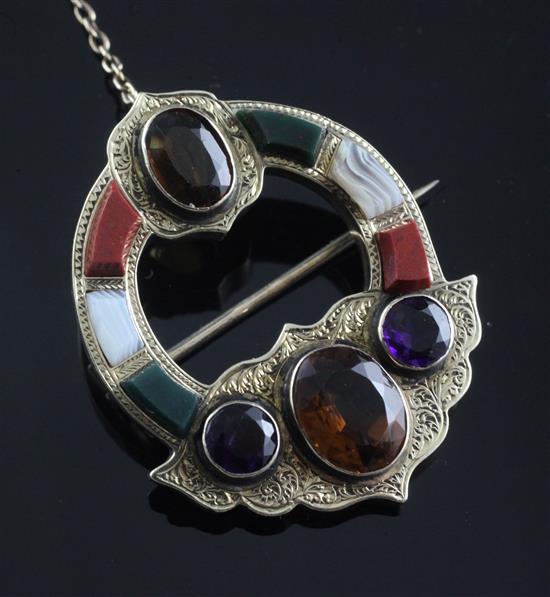 A Victorian engraved gold, Scottish hardstone and gem set brooch, 40mm.